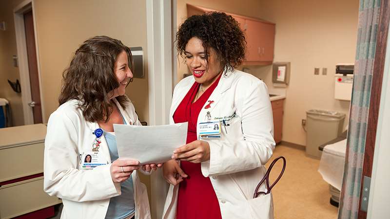 Providers talking in clinic